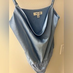 She & sky draped Deja blue bodysuit